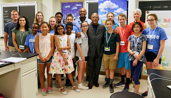 Dr. Henry Louis Gates Jr and Dr. Nina Jablonski with the Finding Your Roots campers.	