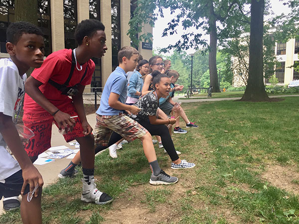 Campers at the starting line for a natural selection game.